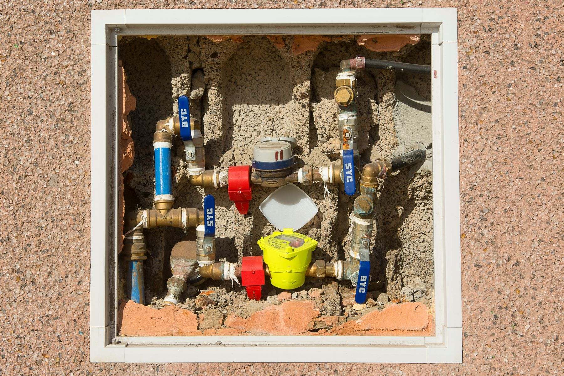 Water meter and shutoff valves in a service box, where main water line repair responsibility changes hands
